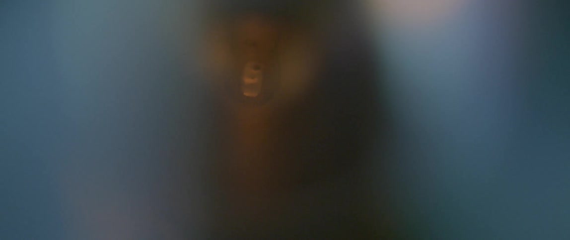 A flame is blown towards the camera