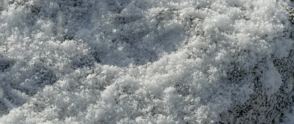 Snow piling onto the ground