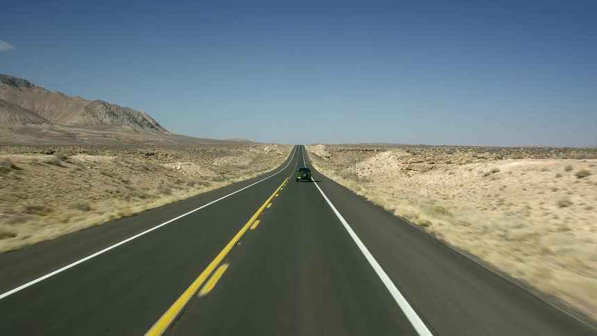 A vehicle is driving down the highway