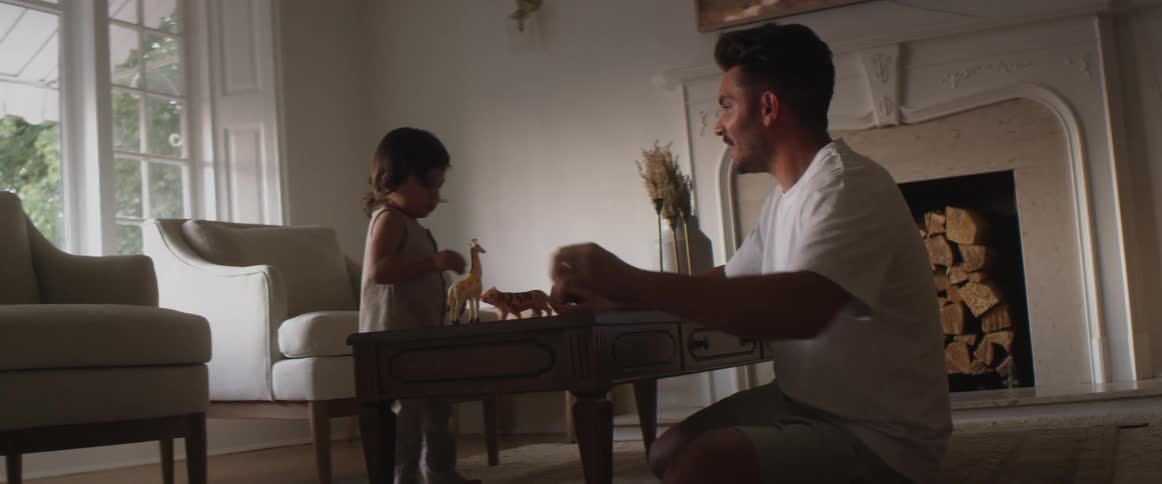 A father and child playing games with each other