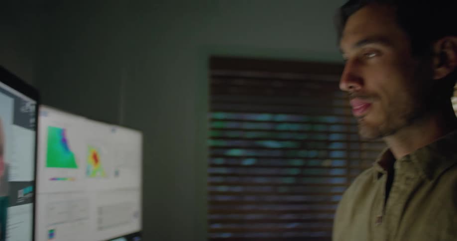 A man talking to two people via a video call