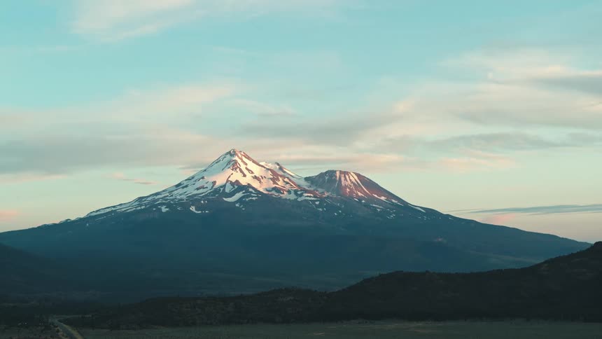 Distant view of high mountains at dusk