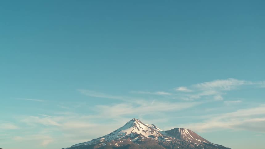 A panning shot revealing a mountain