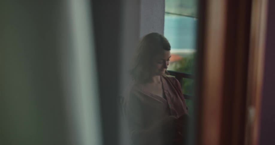 A woman sitting in a room talking