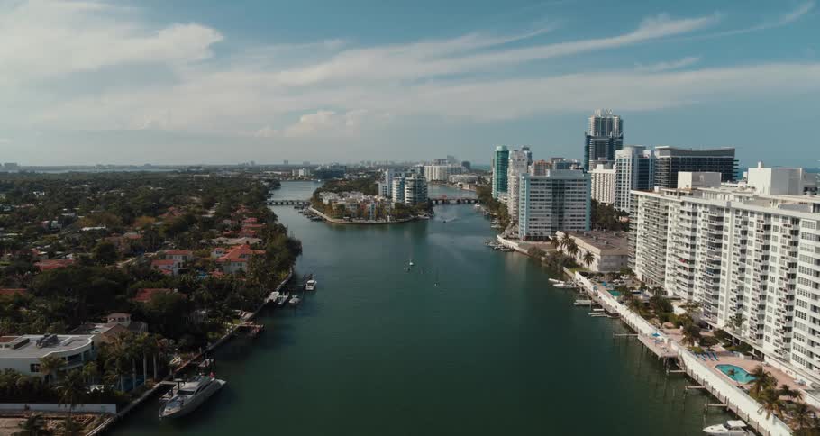 Aerial view of a river running through a waterfront city