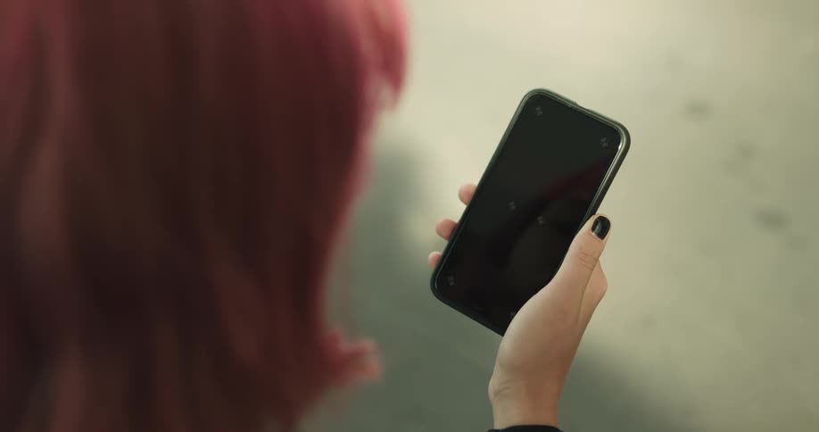 A woman using a smart phone
