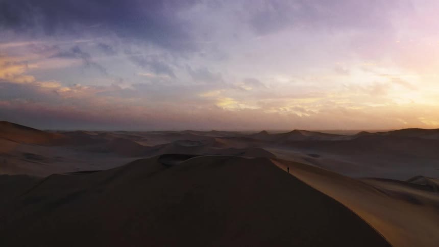 An aerial view of dunes in the desert