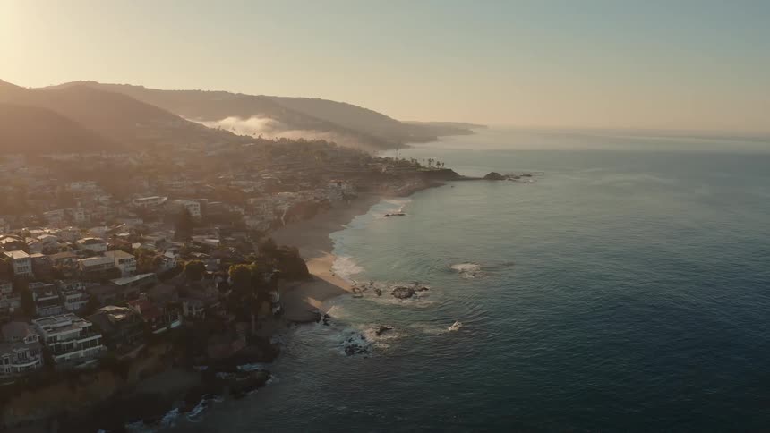 Aerial view of west coast town at sunrise
