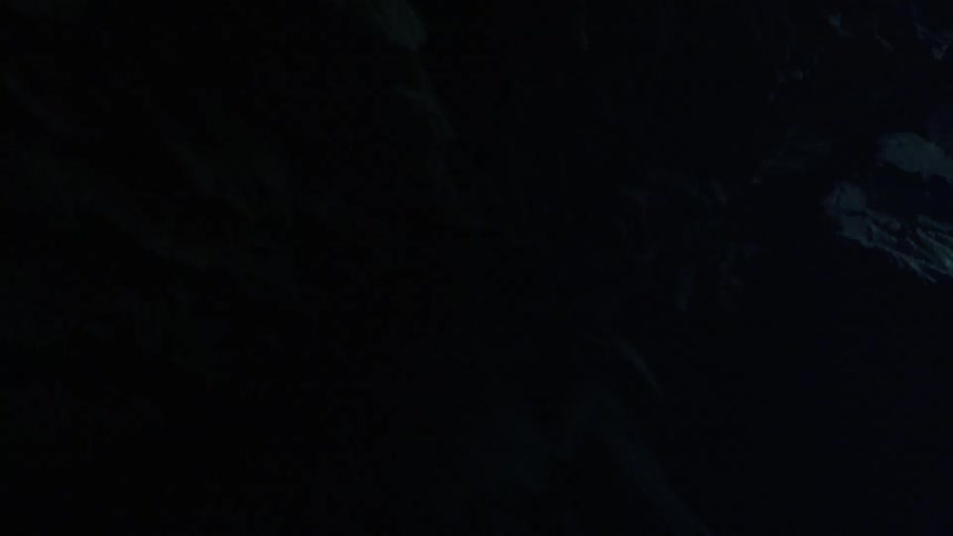 A cave with rocks and walls