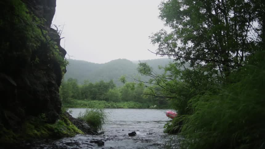 A stream pours water into a lake