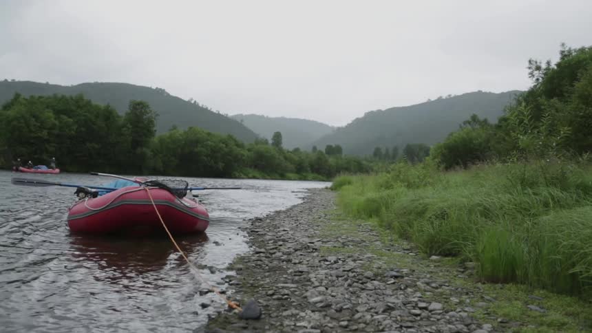 A raft is docked to the shore