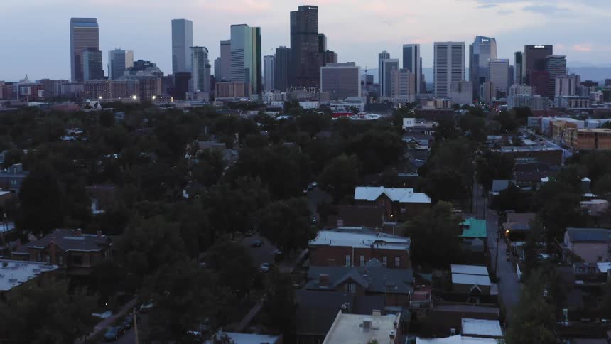 An aerial view of a neighborhood and city