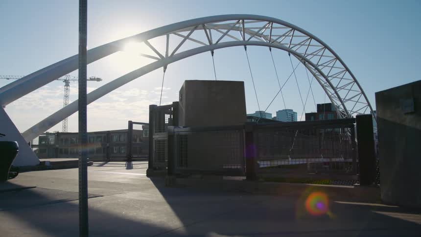 A view of a bridge in the city in a day