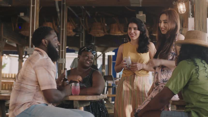 A group of friends having drinks at a bar