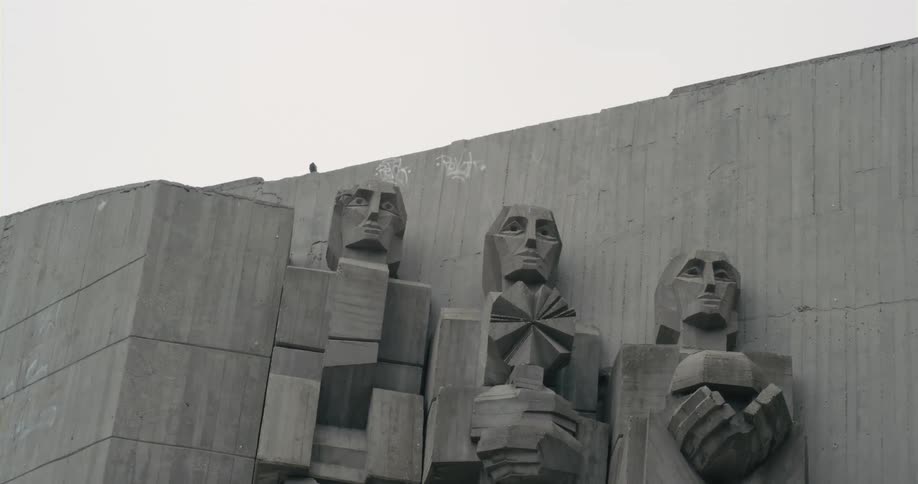 A bird sits on the park monument of the bulgariansoviet friendship
