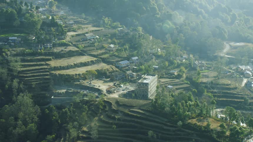 Buildings cover the mountain landscape