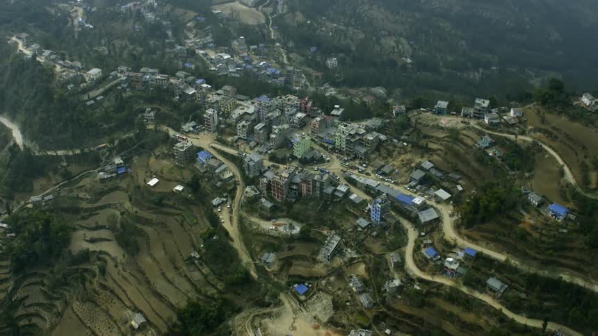 Roads traverse through and across a mountain village