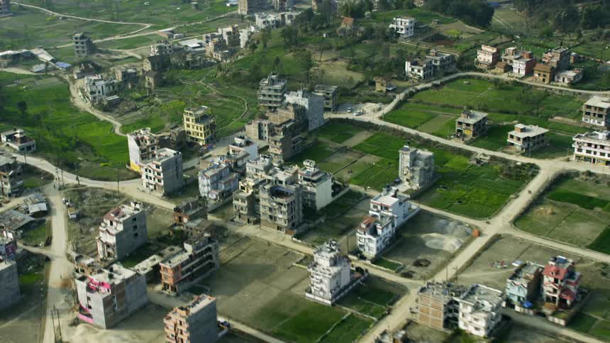 Many buildings and roads on flat land