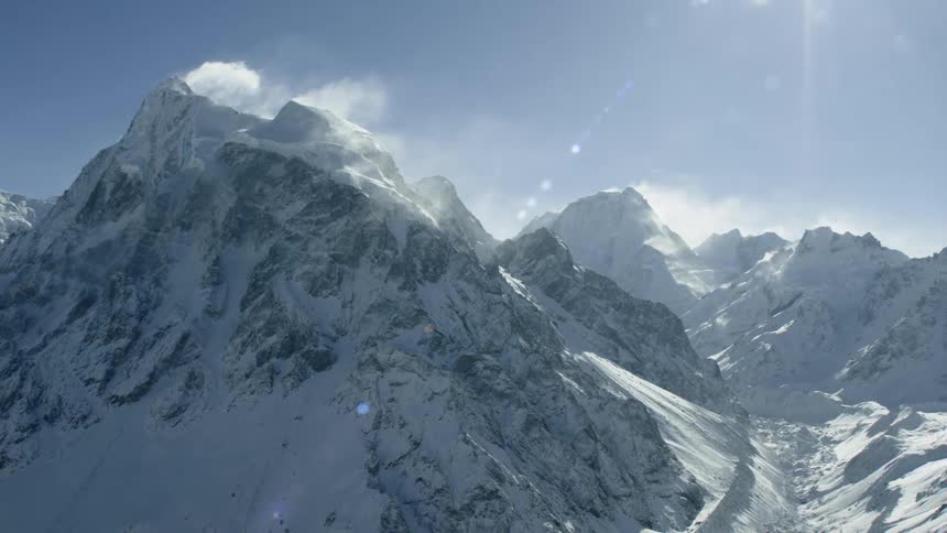 Snow and ice cover the mountains