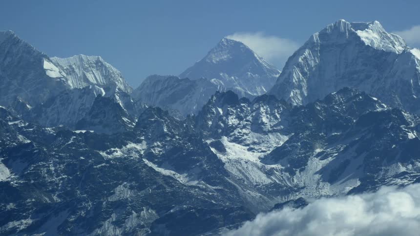 Snow and ice cover the mountain