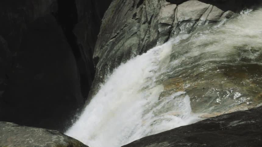 A waterfall over a large cliff