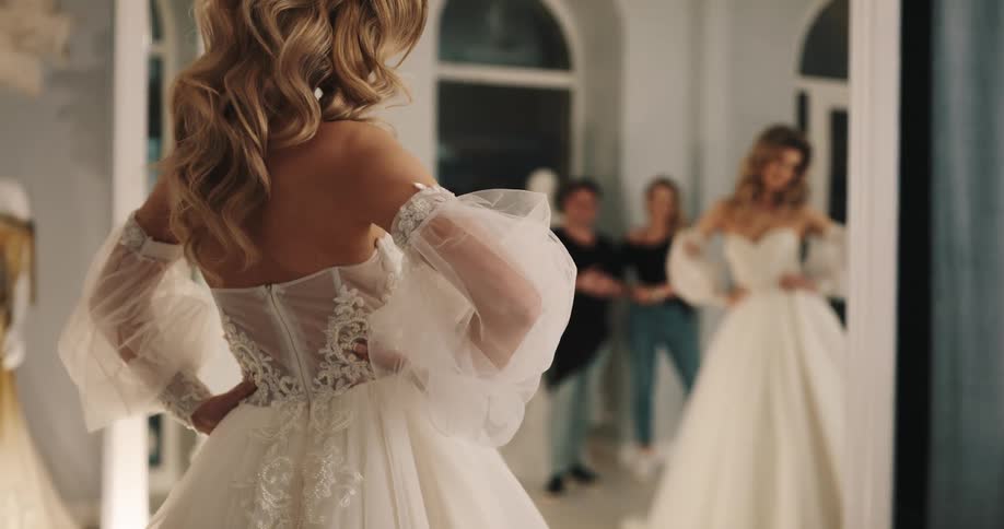 A view of a woman modeling a dress