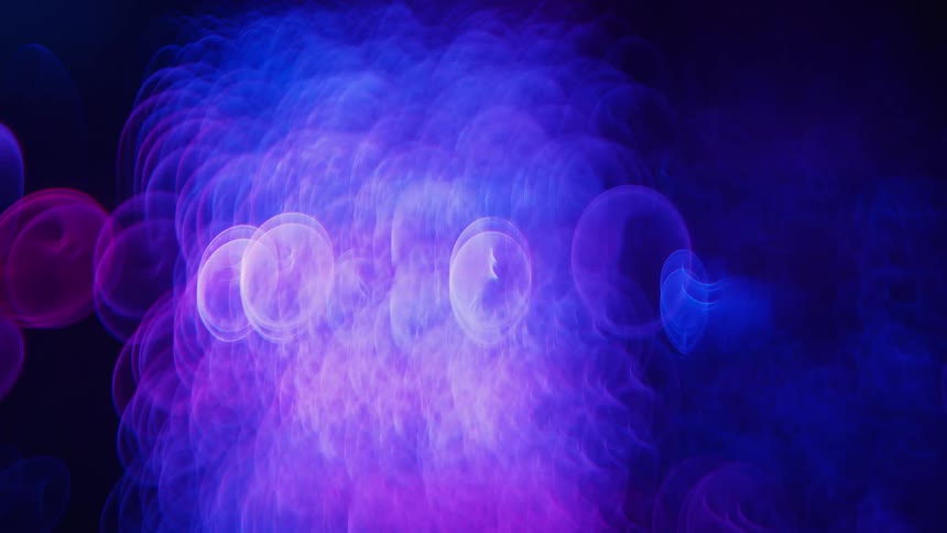 Digital image of blue and purple ovals appear and merge