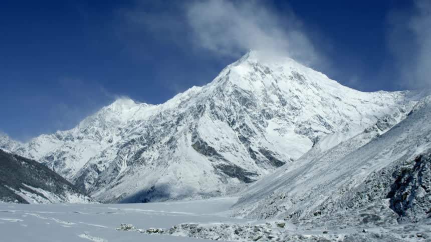 Snow and ice cover the mountains