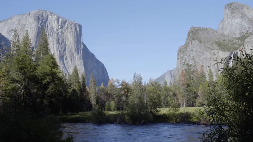 View of a body of water before two mountains
