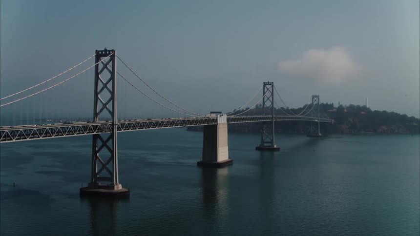 Traffic moves over the large bridge
