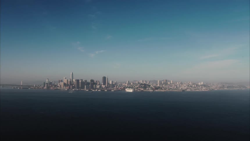 Past the ocean is a large city