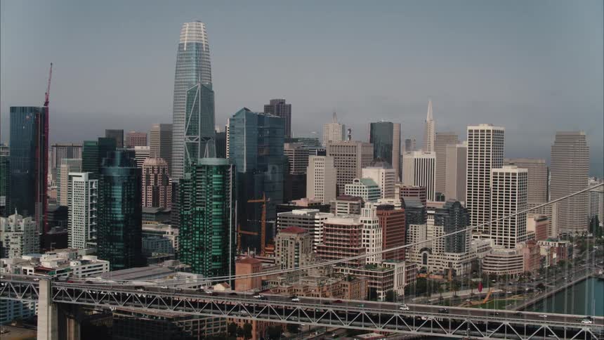 An aerial view of a city with tall buildings