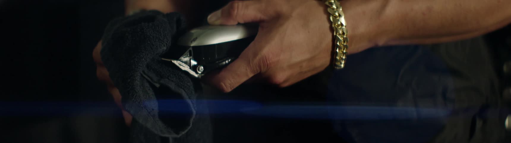 Close up of someone cleaning a razor