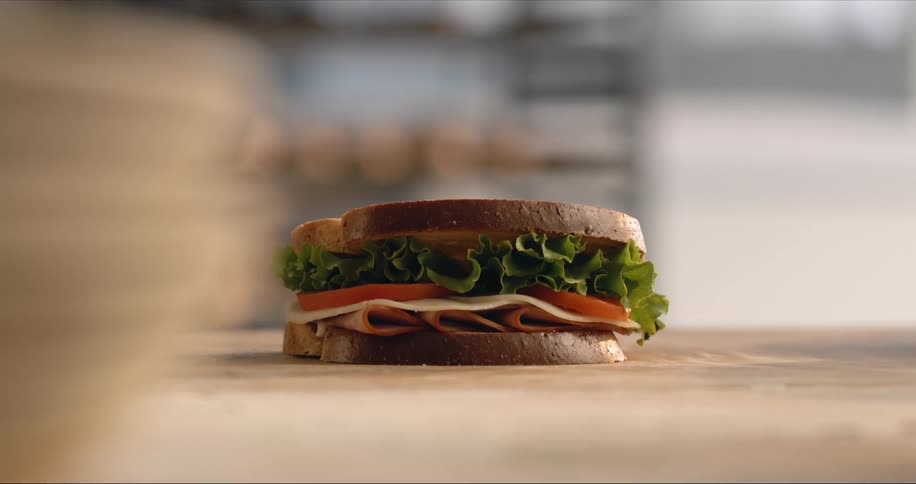 A sandwich is sitting on a table