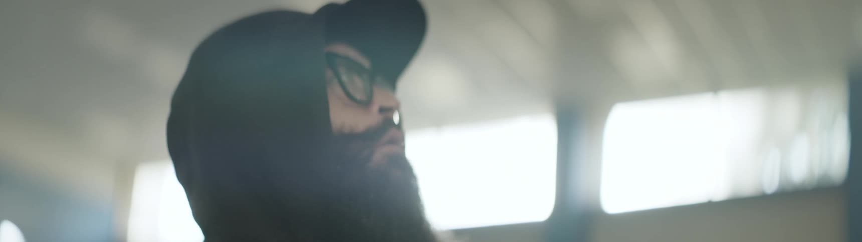 Close up of a man's face in a gym