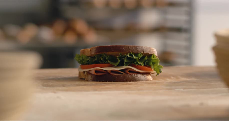 A sandwich is sitting on a table
