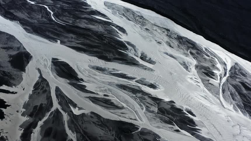 Aerial view of ice covered rocky terrain