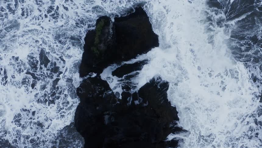 A rocky coast with water and waves