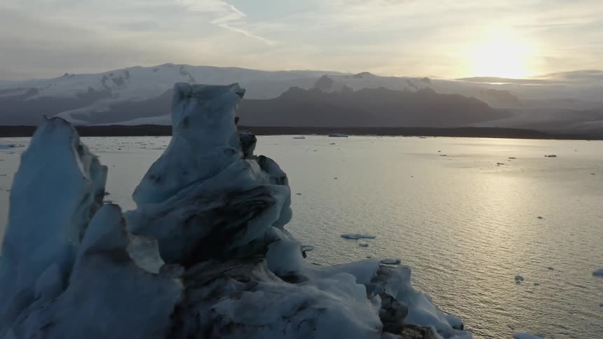 An aerial view of ice floating in the ocean