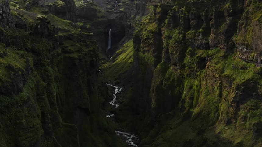 Aerial view of a river running at the bottom of a ravine