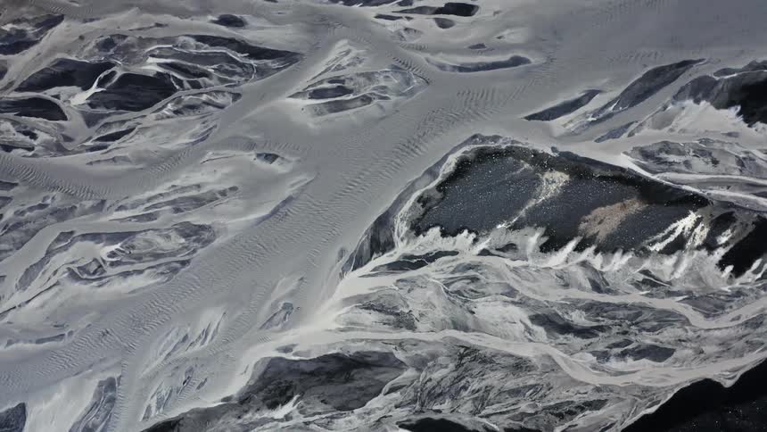 The land is covered with ice below