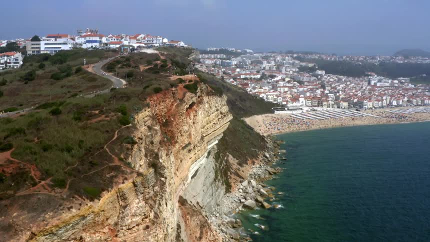 An aerial view of a cliff at the beach