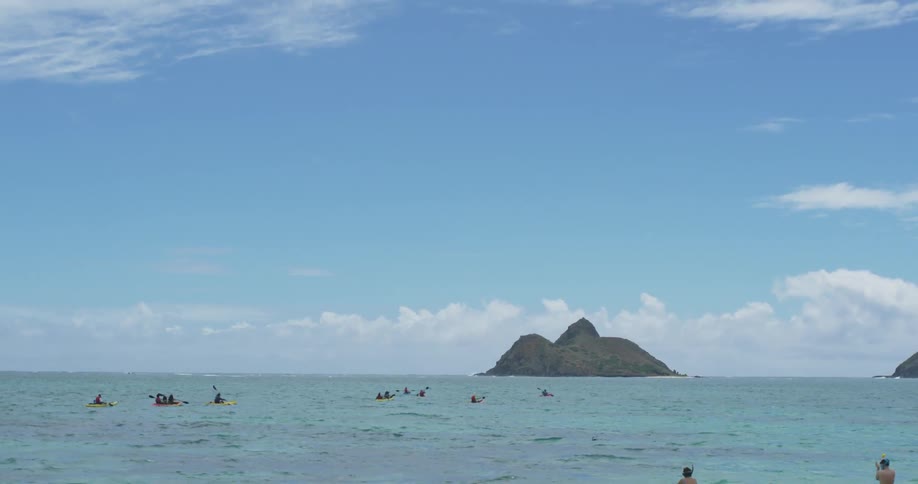 People kayaking in the ocean