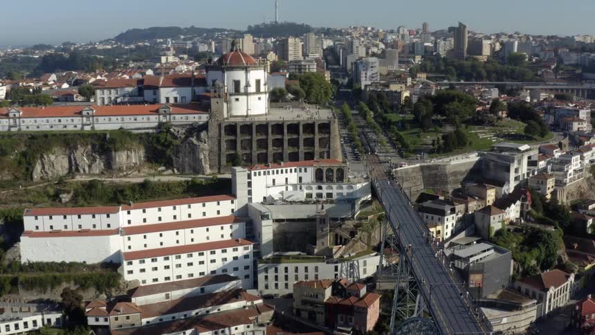People are walking over the bridge in the city