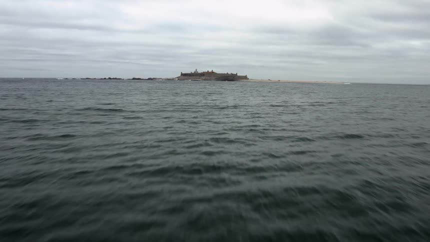 A landscape view an island in the ocean