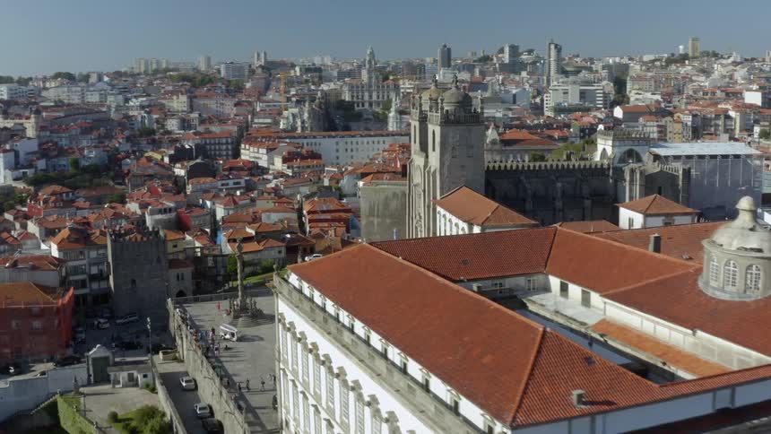 An old church is in the middle of a large city area