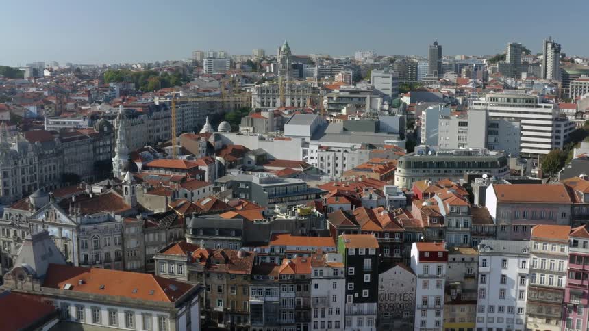 Buildings in a metropolis under a clear blue sky