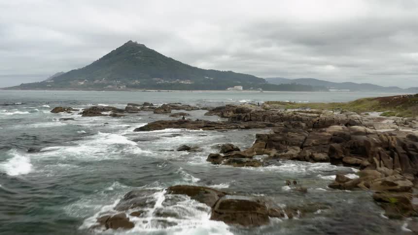 A fort sits on an island in the ocean