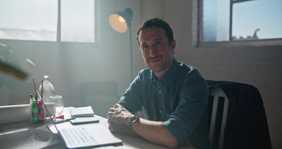 A man sitting at a desk in an office