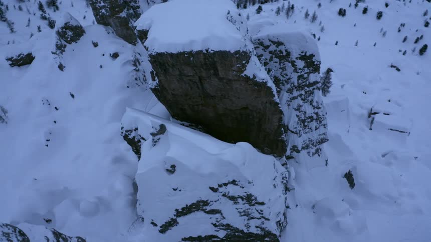 A cliff covered with snow and ice